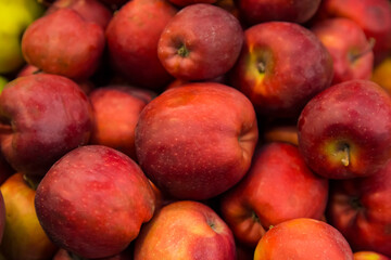 Fototapeta na wymiar Seasonal fruits at the agricultural market, apples