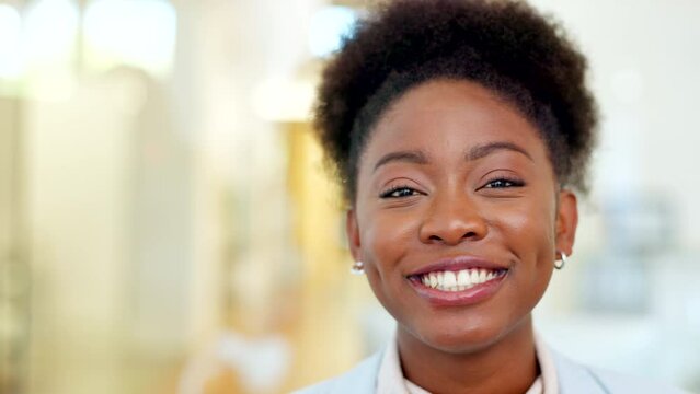 Face of a happy female kindergarten teacher smiling and laughing while standing in her classroom at work. Young educator or private tutor feeling confident about an upcoming primary school lesson