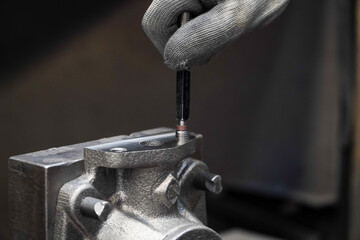 Mechanic inspection industrial thread plug gauge workpieces,industrial concept