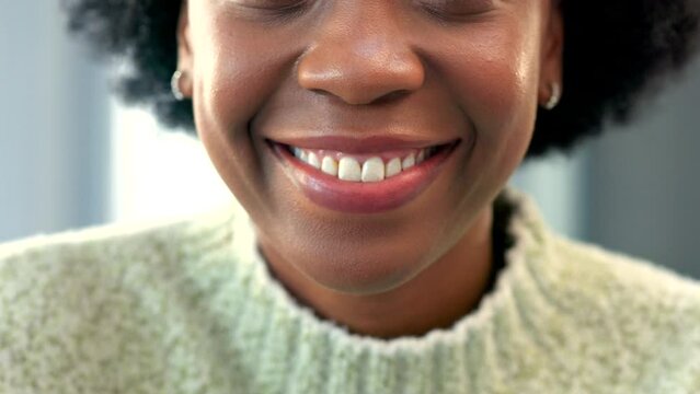 A happy girl smiling with straight teeth. Mouth closeup of a woman with perfect or flawless dental and oral health, feeling and looking confident after her orthodontics or cosmetics appointment