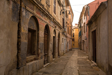Fototapeta na wymiar A quiet residential street in the medieval centre of Izola, Slovenia 