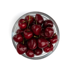 cherries in glass bowl isolated on white