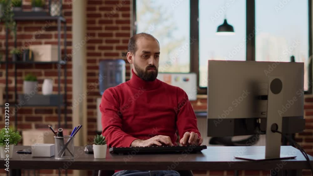 Poster project manager using computer to analyze business charts and create financial statistics at desk. o
