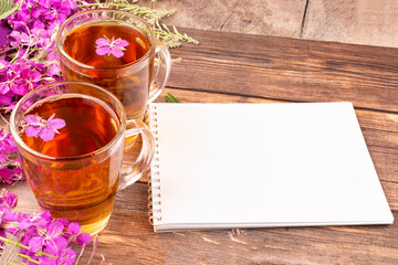 A drink (decoction) from the leaves and flowers of the medicinal plant ivan-tea (kipreya,...