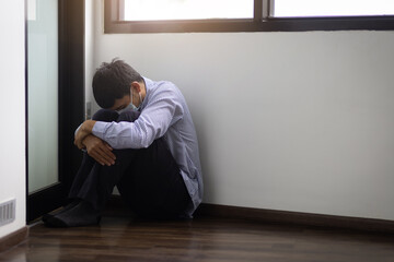Fototapeta premium A man who is sad and depressed is worried.