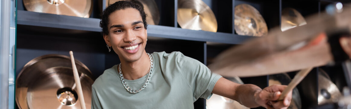 Positive African American Man Playing Drums In Music Store, Banner.