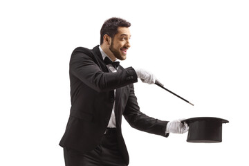 Man making a magic trick with a wand and a tophat