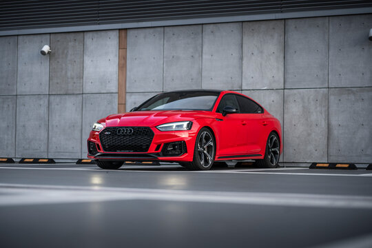 Wroclaw, Poland - October 3, 2020: Red Audi RS5 sedan on mall parking
