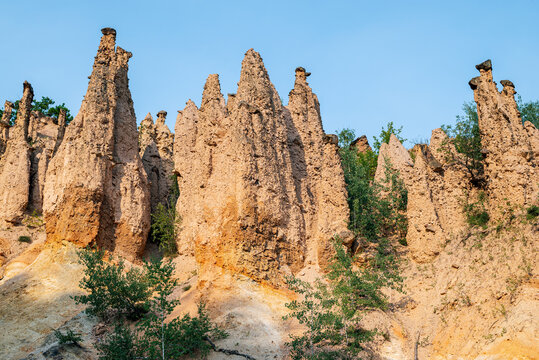 Devils Town is a rock formation consisting of about 200 earth pyramids or "towers" in Serbia, Djavolja varos in Serbia