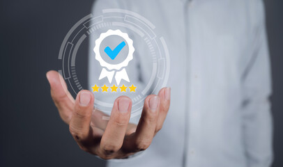 Hand shows the sign of the top service Quality assurance, Guarantee, Standards, ISO certification and standardization concept. Approved badge icon symbol medal award ribbon with 5 stars