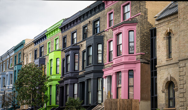 Colourful painted houses in the well known Portobello Road area of Notting Hill, London, UK