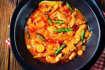 colorful turkey fricassee with asparagus and paprika