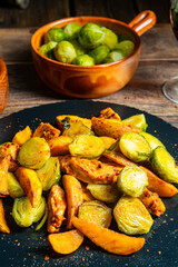 Brussels sprouts fried chicken breast and potatoes