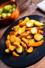 Brussels sprouts fried chicken breast and potatoes