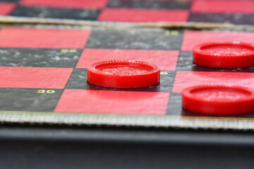 Red Checkers on a Checkerboard
