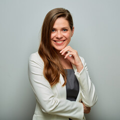 Smiling business woman in white suit isolated portrait.