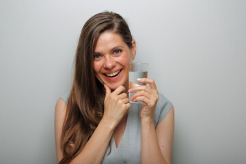 Smiling woman holding water glass isolated female portrait.