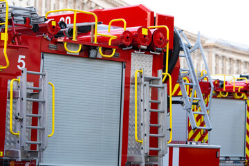 Red fire truck. Fire-technical transport. Fire trucks are preparing to put out the fire.
