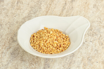 Crunched roasted peanut in the bowl