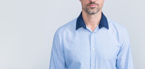 mature boss in office shirt wearing eyeglasses