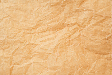 Fototapeta premium Crumpled thin parchment paper as texture or background, baking parchment