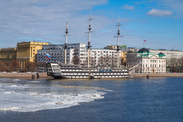 The Russian ship in the cityscape on April afternoon, Saint Petersburg