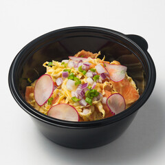 cole slow salad in a plastic container. concept: food delivery, fast food