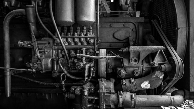 Close up Old rusty generator engine.  black and white photo