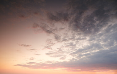 Dark clouds in a sunset sky background with copy space. Cloudscape climate view of dramatic sky...