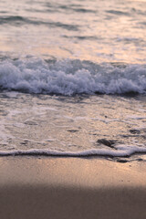 foamy waves on the beach
