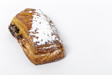 Homemade buns with chocolate and icing sugar