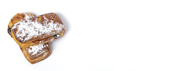 Homemade buns with chocolate and icing sugar