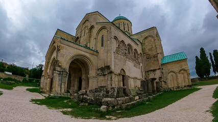 Fototapeta na wymiar Panoramic view of Bagrati Cathedral in Kutaisi, Imereti, Georgia (Sakartvelo),Central Asia, Europe.Historical architecture of Kutaisi cathedral built in the 17th century.The Cathedral of the Dormition