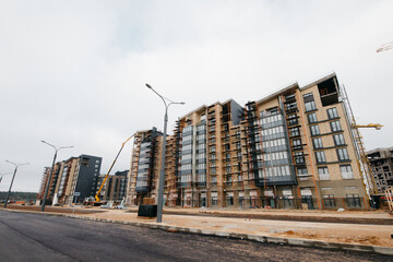 Modern black facade of a residential designed concrete apartment building.