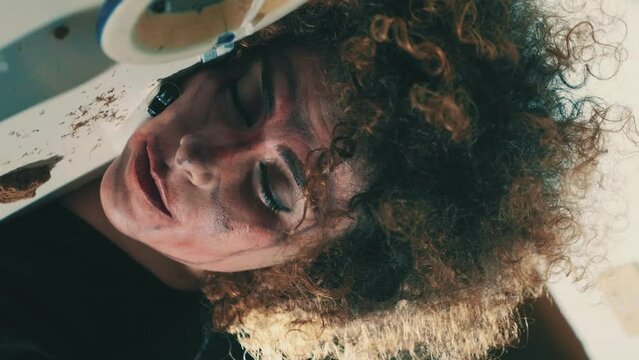 alienation, drugs - young woman high on drugs with her head on the table