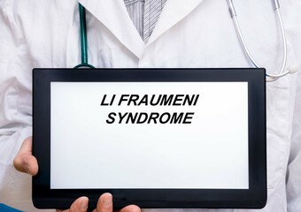 Li Fraumeni Syndrome.  Doctor with rare or orphan disease text on tablet screen Li Fraumeni Syndrome - obrazy, fototapety, plakaty