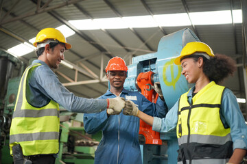 Team maintenance engineers men and women inspect relay protection system with laptop comp. They...