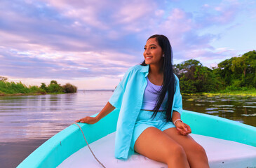 Young woman enjoying boat ride at isletas de Granada, Nicaragua.