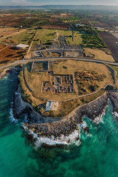 Flight over the port of ancient Engnazia, Fasano (BR) Puglia on the Adriatic Sea, an ancient port of Roman origin today an archaeological site. You can see the buildings of the city and the ancient po