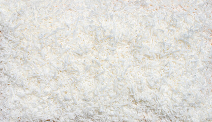 Obraz premium pile shaved coconut shaving shavings cut fresh fruit display cooking background food pattern large dry coconuts