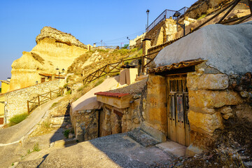 Houses built within the mountain rock at the top of the hill, San Esteban de Gormaz, Soria.