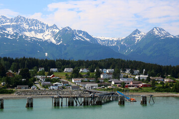 View of Fort William H. Seward from Chilkoot Inlet and mountains in the background, Haines, Alaska,...