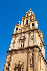Fototapeta na wymiar Impressive bell tower of the Cathedral of Murcia 