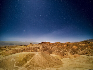 Zabriskie Point at night with stars above