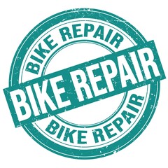 BIKE REPAIR text written on blue round stamp sign