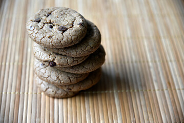 Oatmeal cookies with chocolate chips on a mat