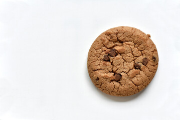 Oatmeal cookies with chocolate chips on a white background. Cookies are delicious close-up.