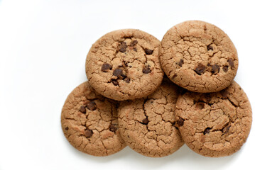 Oatmeal cookies with chocolate chips on a white background. Cookies are delicious close-up.