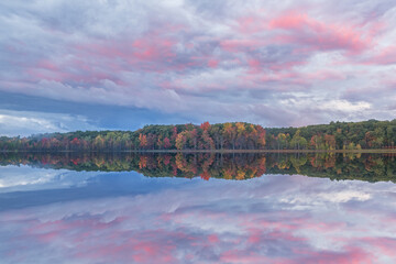 Autumn landscape at dawn of the shoreline of Deep Lake, Yankee Springs State Park, Michigan, USA