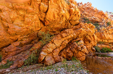 Dramatic folded rock and wide stream